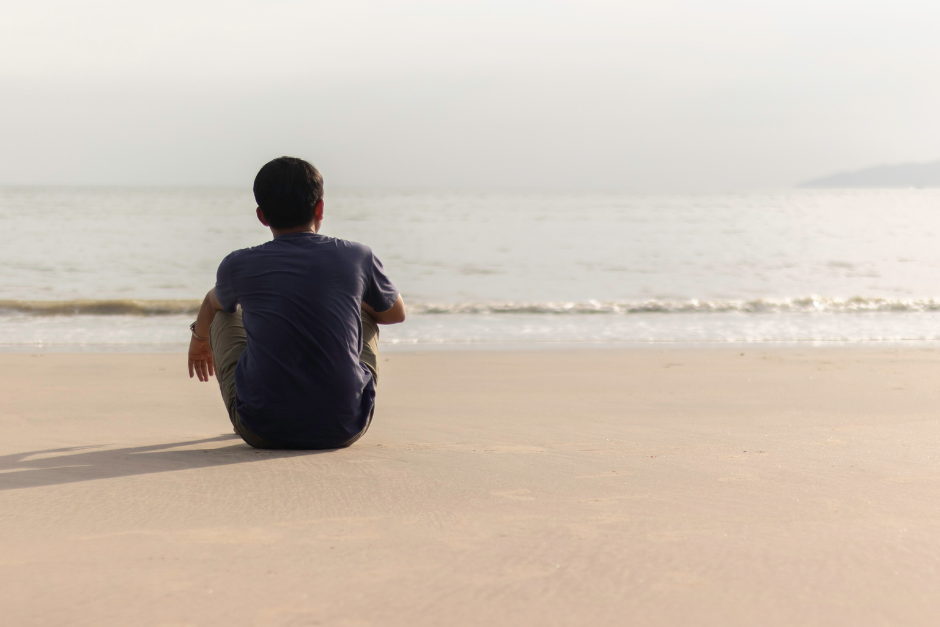 Man sitting on beach