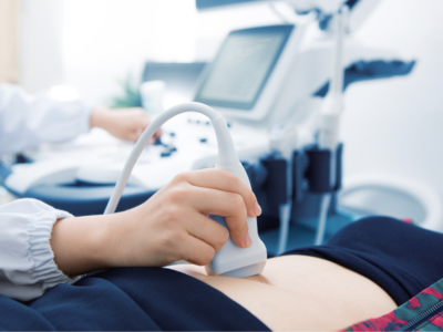 Adult getting an abdominal ultrasound