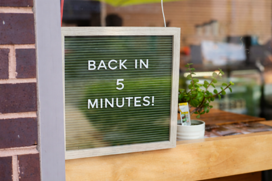 Sign reading Back in 5 minutes