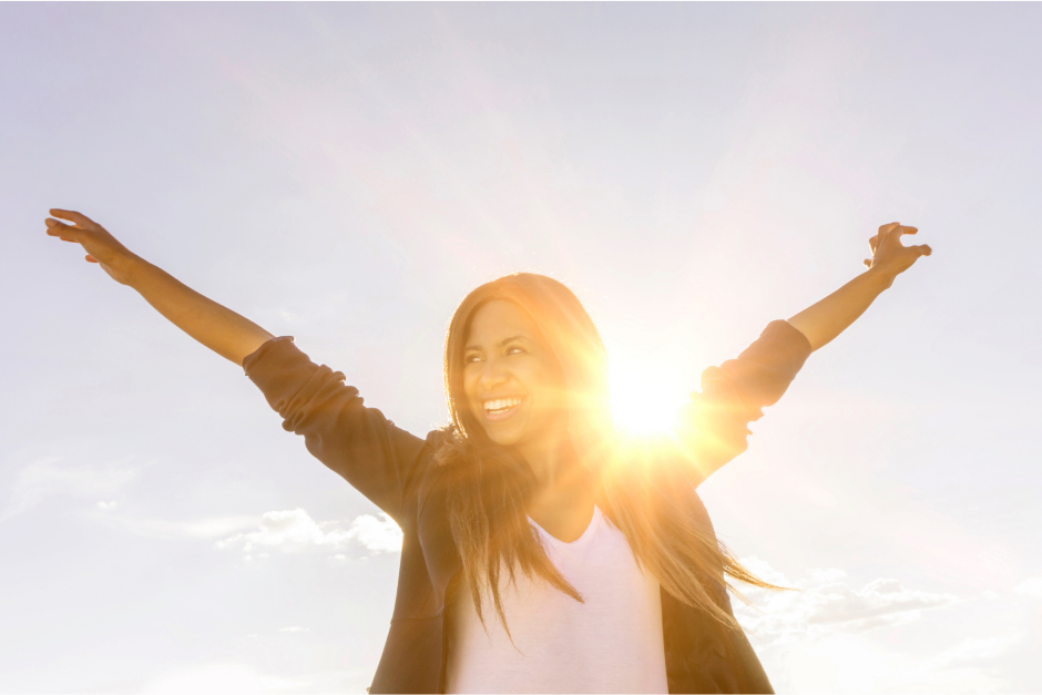 Happy woman enjoying the sun