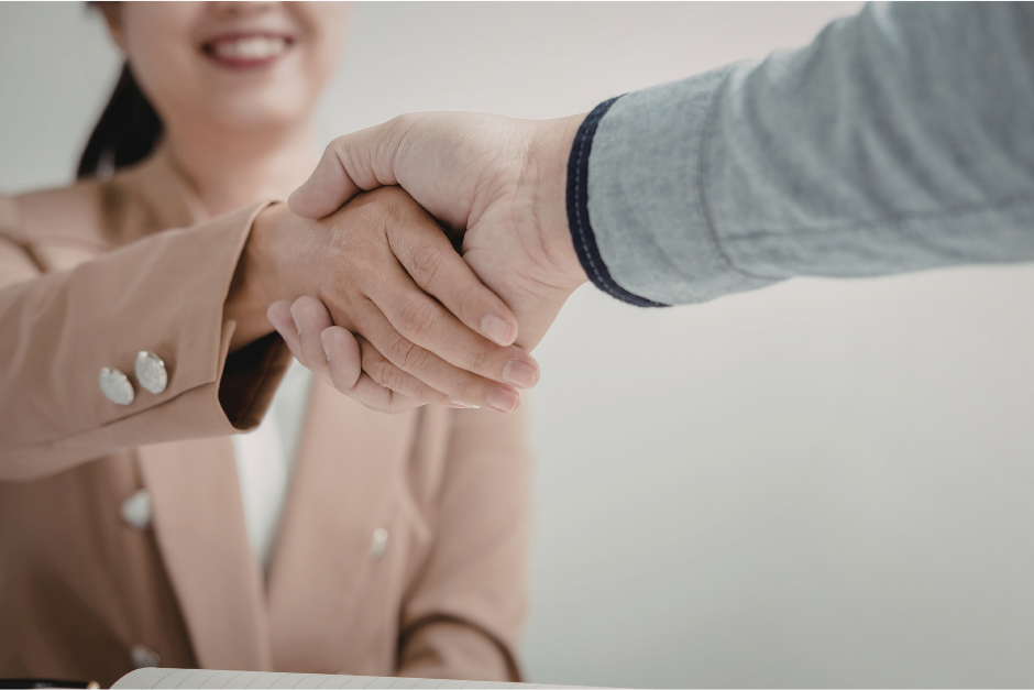 Two people shaking hands