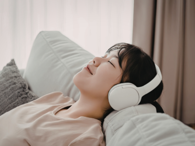 Woman listening to headphones