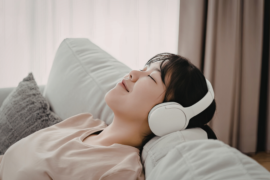 Woman listening to headphones