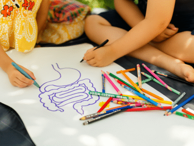 Kids drawing a digestive system